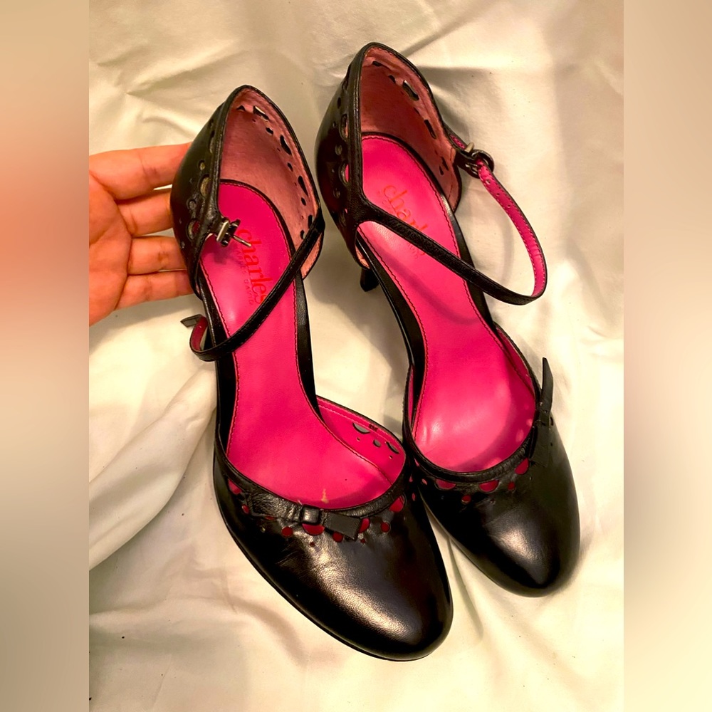 Charles Davis round toe black leather heels.